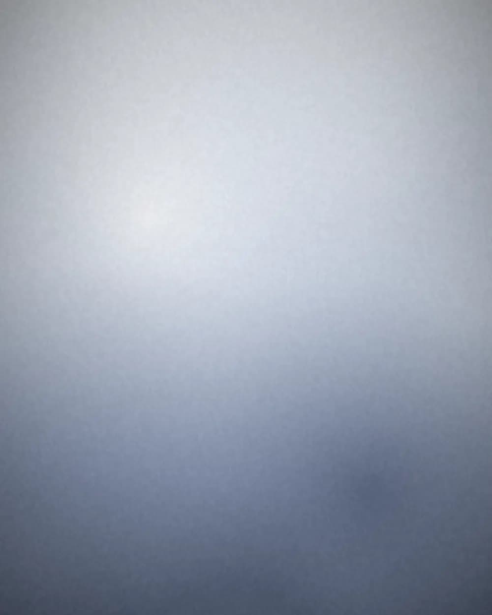 Pale slate gradient breaking into white